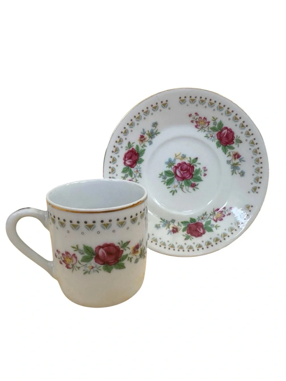 Vintage Espresso Cup and Matching Saucer. White Porcelain with Floral Motif.